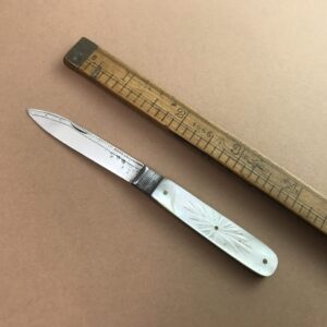 A rare example of a Samuel Kirkby pocket fruit knife with fake hallmarks